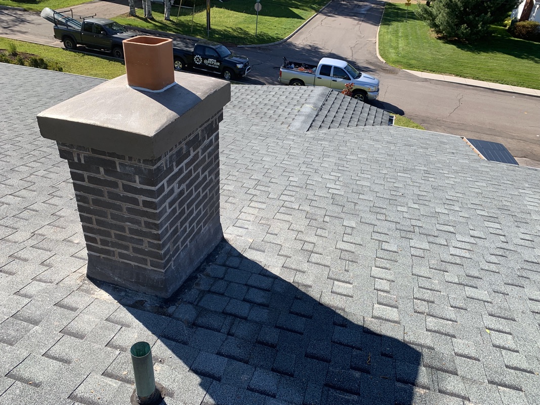 Masonry chimney crown and cap repair in Prince Edward Island